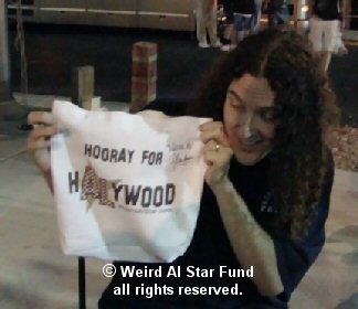 Weird Al with our merchandise